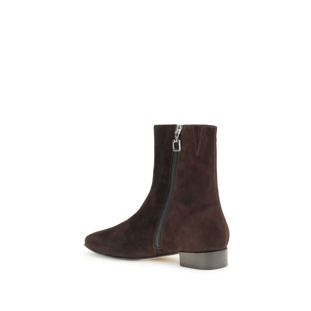 Carel Paris Brown Leather Ankle Boots with side zip and block heel, inspired by 1960s design, ideal for fall-winter. Season: AW25.