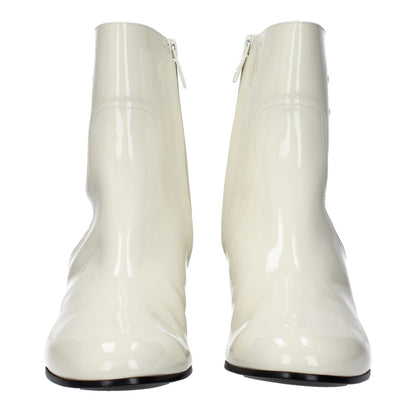 Celine Beige Leather Ankle Boots with side logo and zip closure, mid heels, round toe, patent leather finish.