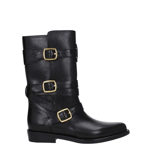 Celine Black Leather Flat Boots with gold buckles, pointy toe, and low heel, featuring aged and vintage effects, casual style.