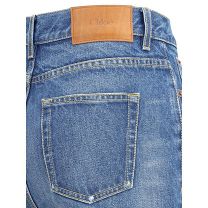 Rear view of Chloé Blue Cotton Flared Jeans showcasing classic five-pocket design and leather label, perfect for modern styling.