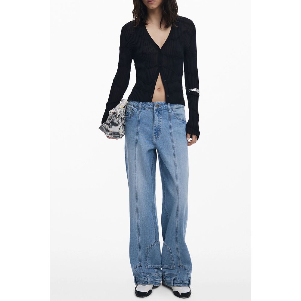 Model wearing Desigual Black Viscose Women Cardigan with stylish jeans, showcasing chic fashion statement in casual attire.