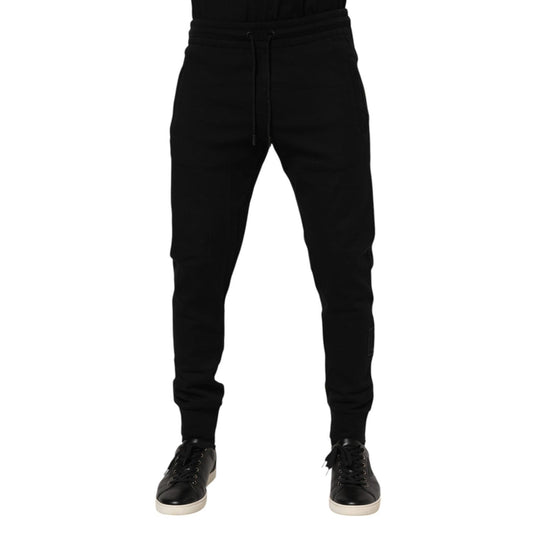 Dolce & Gabbana Black Cotton Jogger Jogging Men Trouser Pants, featuring drawstring closure and logo details, made in Italy.