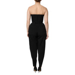 Back view of Dolce & Gabbana Black Wool Strapless Romper Jumpsuit Dress showcasing strapless design and fine tailoring.