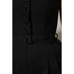Close-up of Dolce & Gabbana Black Wool Strapless Romper Jumpsuit Dress detailing with buttons and high craftsmanship.