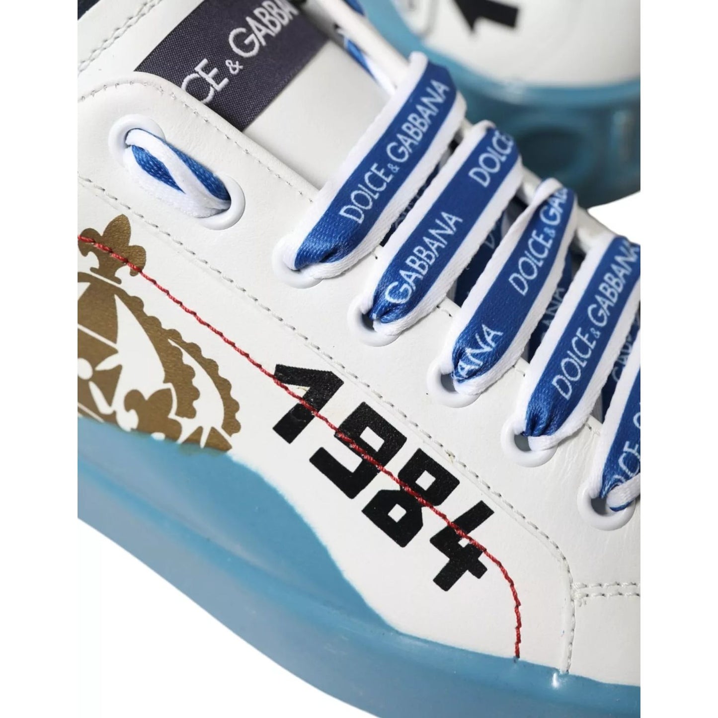 Dolce & Gabbana Blue White Printed Portofino Melt Sneakers in calfskin leather with logo details and rubber sole, close-up view.