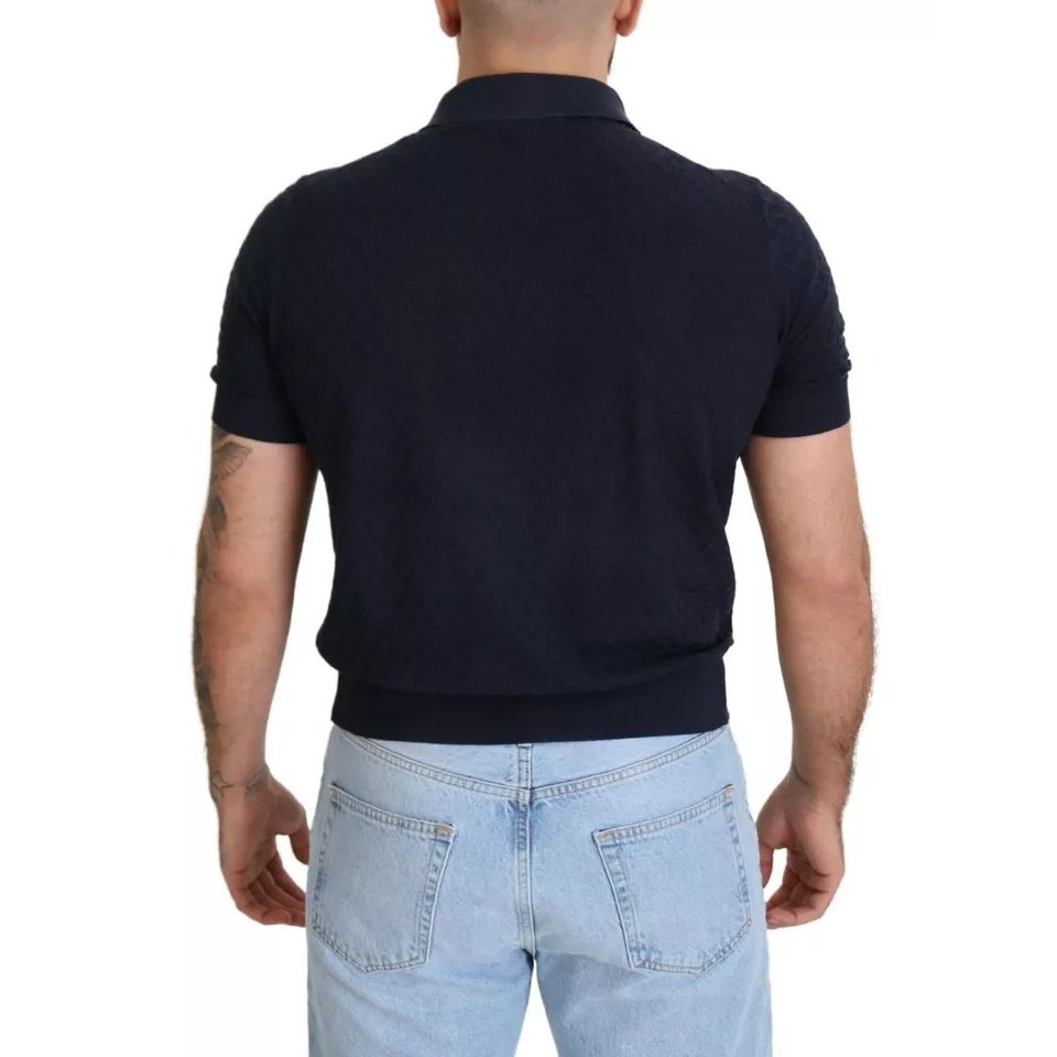 Back view of Dolce & Gabbana Dark Blue Collared Polo Casual Silk T-shirt worn by model, showcasing short sleeves and collar.