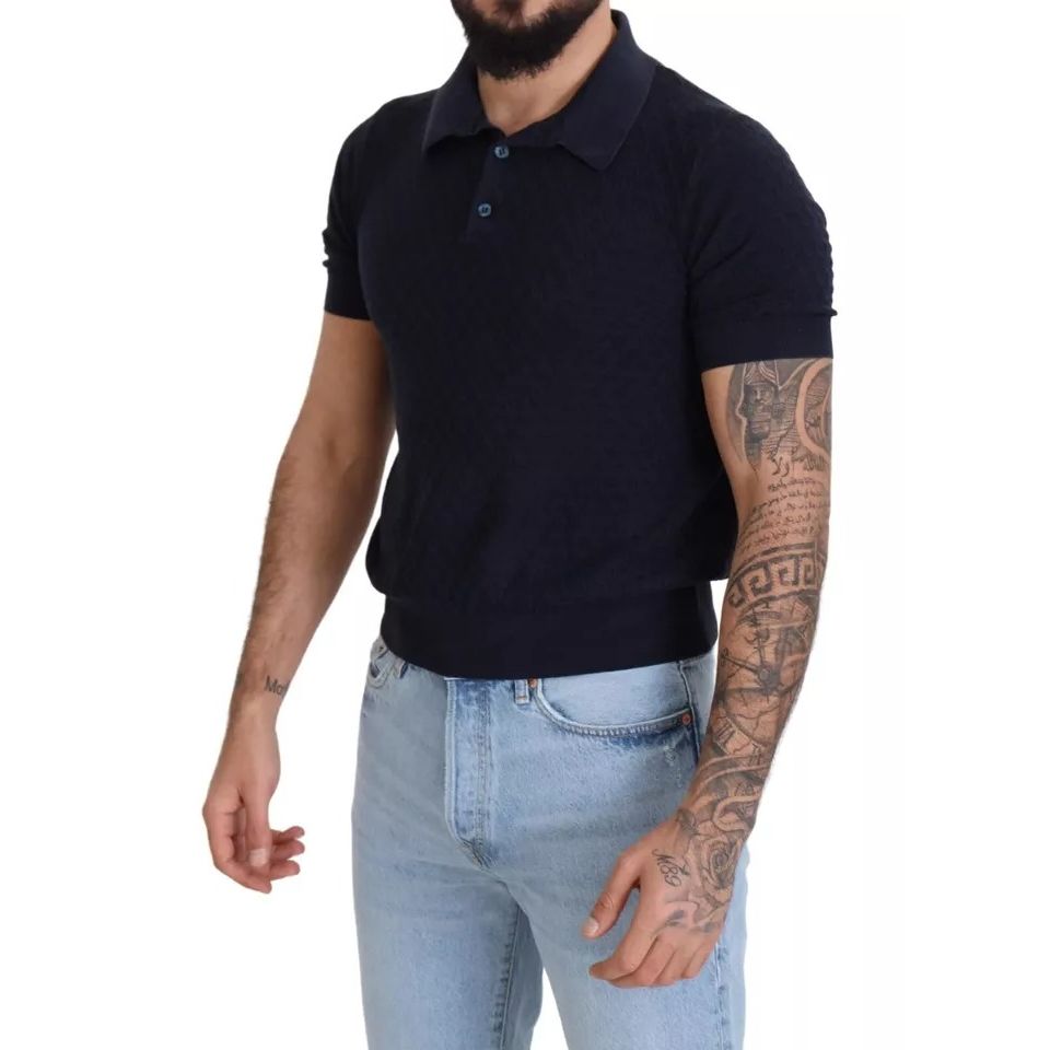 Model wearing Dolce & Gabbana Dark Blue Collared Polo Casual Silk T-shirt with short sleeves and a regular fit.