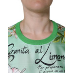 Close-up of Dolce & Gabbana Green Lemon Print Pullover Silk Women Sweater showcasing Granita al Limone print with flowers and text.