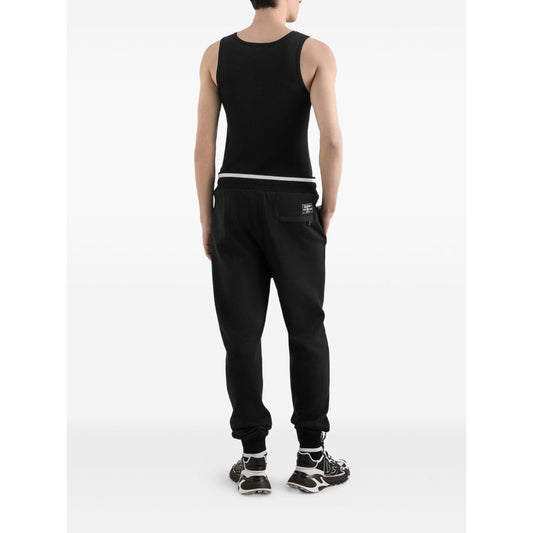 Dolce & Gabbana Logo cotton tank top in black, back view with embroidered logo, sleeveless with round neck and straight hem.