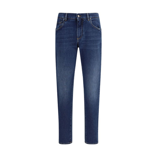 Dolce & Gabbana Mid-Rise Jeans in blue with five-pocket style, button-zip closure, and logo hardware, offering a modern and comfortable fit.