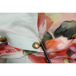 Close-up of Dolce & Gabbana Multicolor Floral Patchwork Ascot Collar Top showcasing vibrant floral detail.