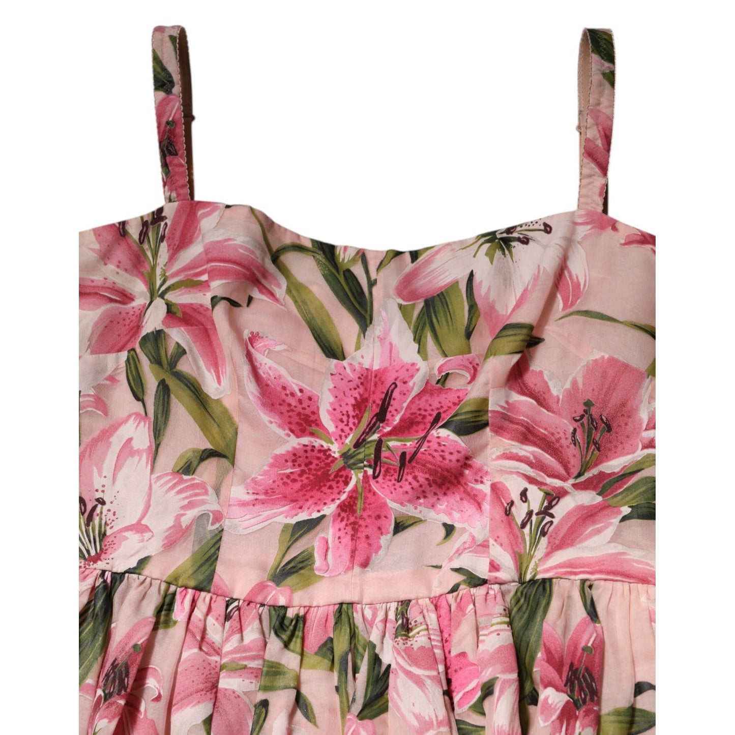 Dolce & Gabbana Pink Floral Lily Print Midi Sleeveless Dress close-up view, showcasing the intricate floral design and pleated silk fabric.