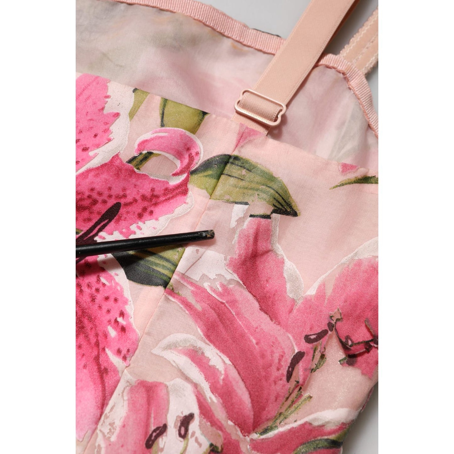 Close-up of Dolce & Gabbana Pink Floral Lily Print Midi Sleeveless Dress showcasing vibrant lily design and fabric details
