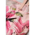 Close-up of Dolce & Gabbana Pink Floral Lily Print Midi Sleeveless Dress showcasing vibrant lily design and fabric details