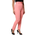 Dolce & Gabbana Pink High Waist Dress Tapered Trouser Pants on model, showcasing tailored fit and chic style for elegant occasions.