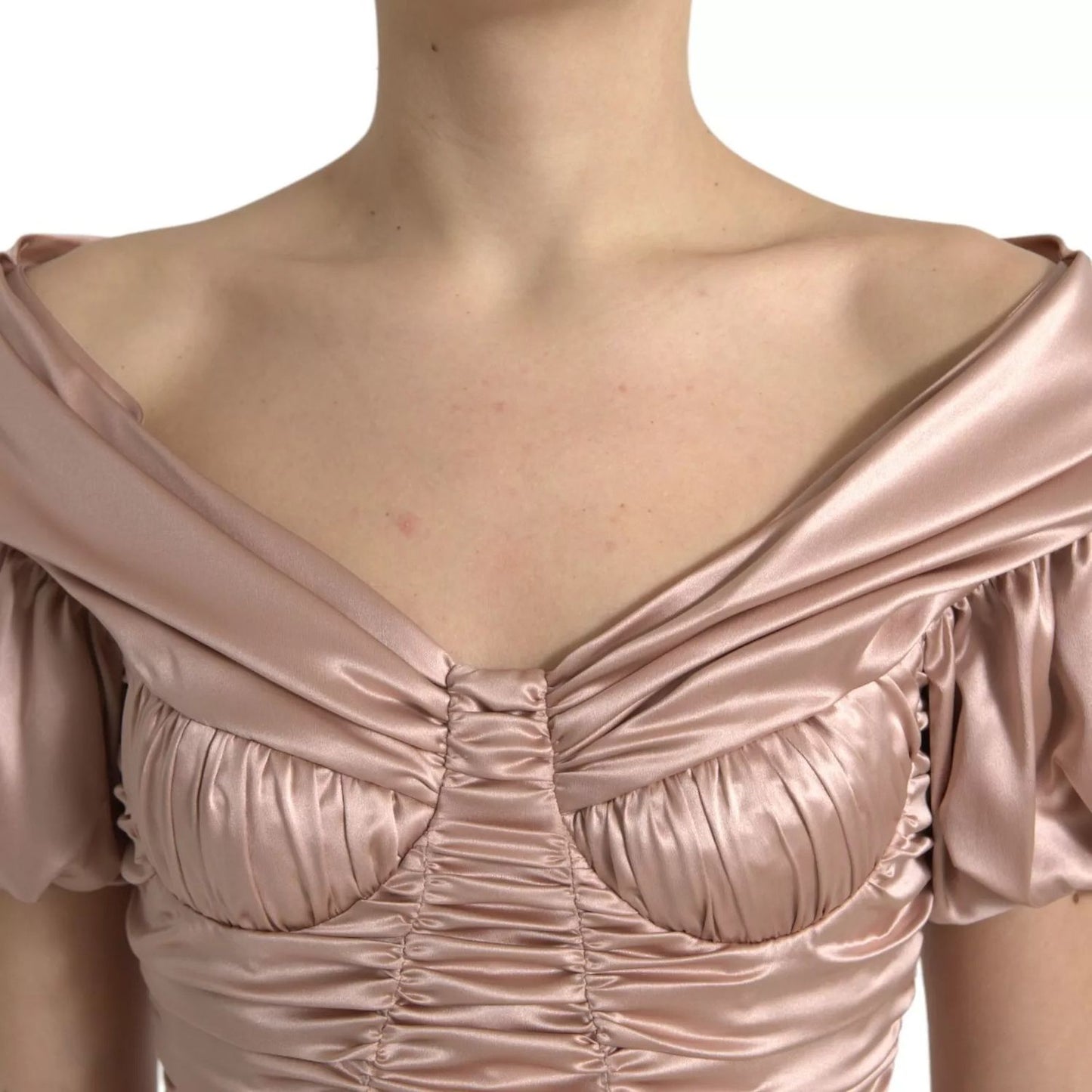 Close-up of Dolce & Gabbana Pink Silk Stretch Sheath Mermaid Gown Dress showcasing elegant off-shoulder detail.