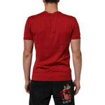 Back view of Dolce & Gabbana Red Crown Bee Cotton Short Sleeve T-shirt on a person, showcasing its bold color and premium fabric.