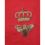 Dolce & Gabbana Red Crown Bee Cotton Short Sleeve T-shirt featuring embroidered crown and bee motif, close-up view.