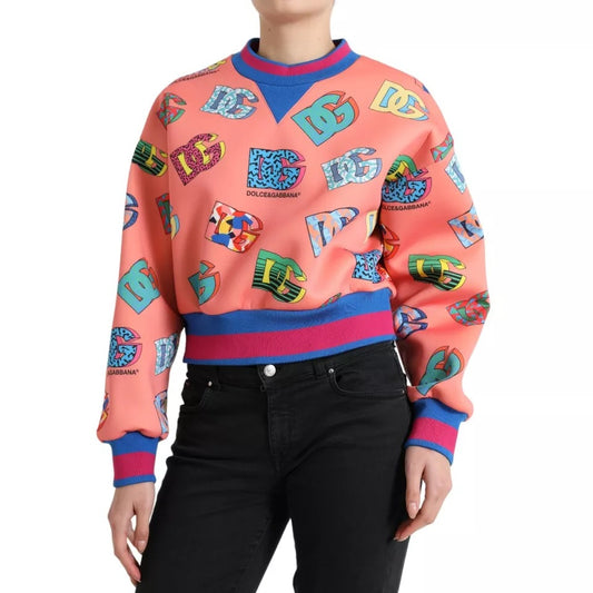 Dolce & Gabbana Salmon Pink Logo Print Sweatshirt Sweater; crew neck, long sleeves, colorful logos, exclusive Italian craftsmanship.