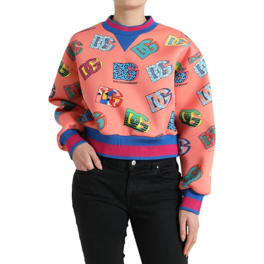 Dolce & Gabbana Salmon Pink Logo Print Sweatshirt Sweater with vibrant multicolor design, worn by model, crew neck, long sleeves.
