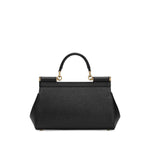 Dolce & Gabbana Sicily Medium Handbag in black leather with foldover top and push-lock fastening, featuring adjustable shoulder strap.