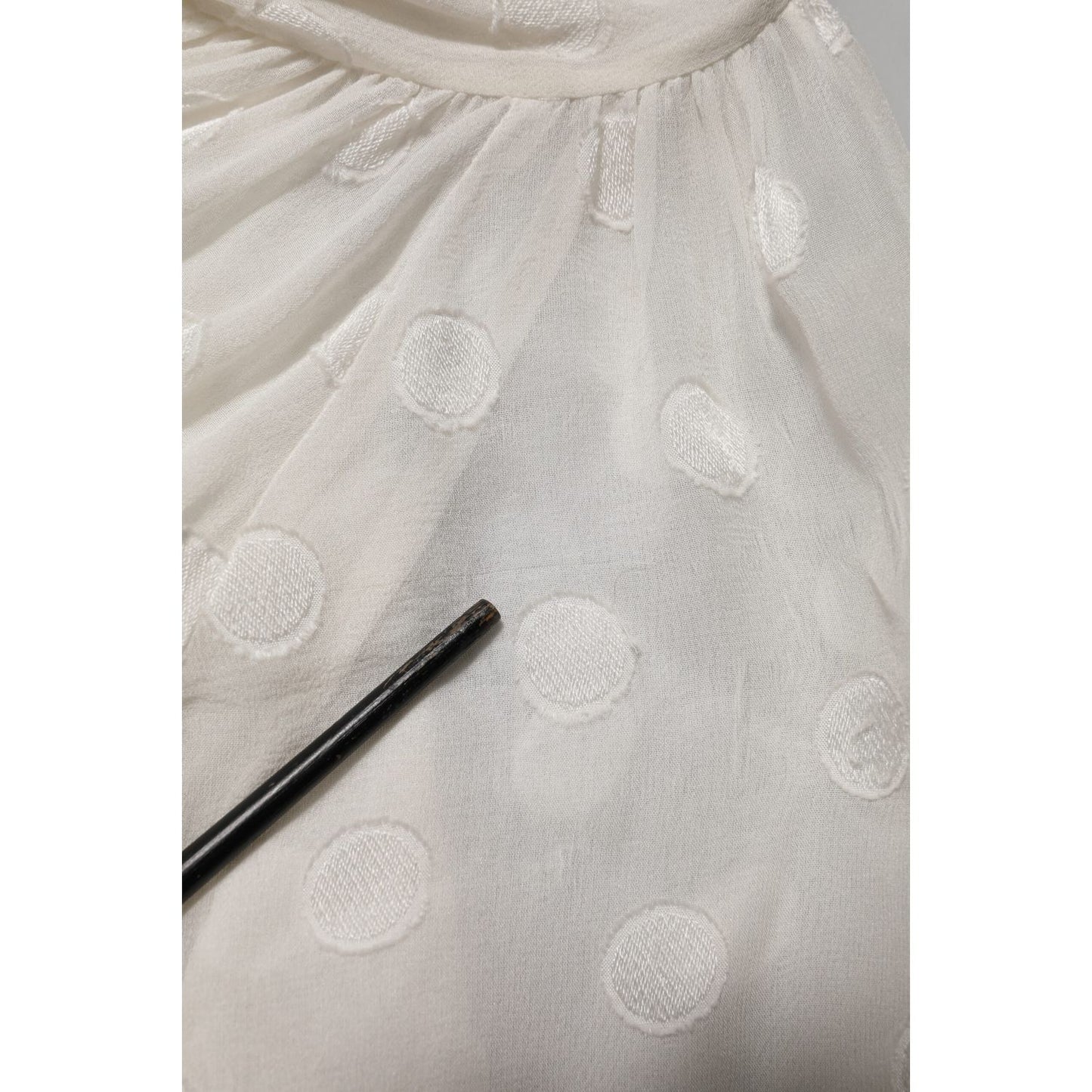 Dolce & Gabbana White Polka Sheer Silk Bow Tie Shirt Blouse Top fabric texture with white polka dots pattern