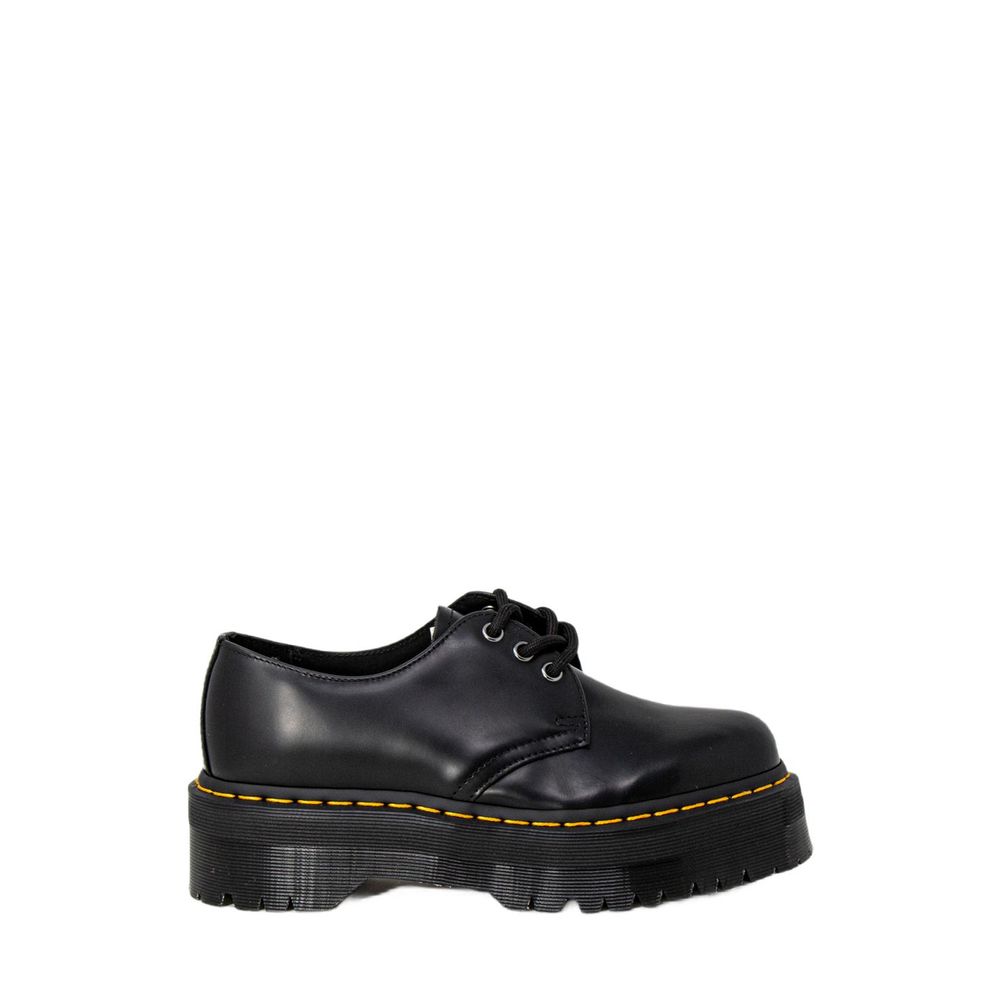 Dr. Martens Black Leather Lace-Up Boots with thick sole and iconic design, showcasing durability and style.