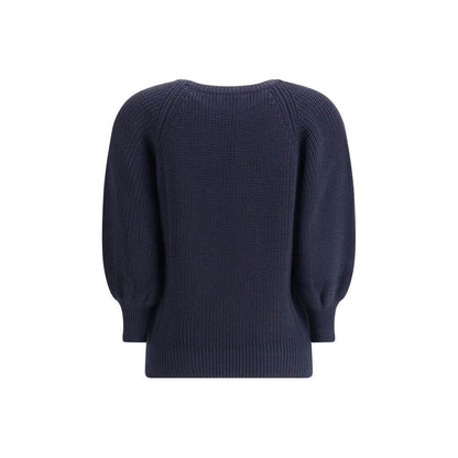 Back view of Ella Blue Merino Wool Sweater with a chunky knit and ribbed hem, perfect for cold weather. Season: AW25.