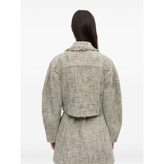 Back view of a GANNI Jackets Beige tweed jacket with frayed detailing, pointed collar, and chest pockets.