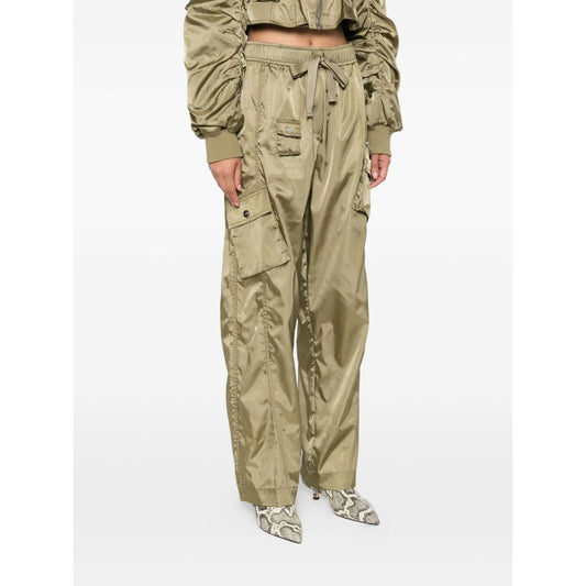 GANNI Trousers Green featuring sage nylon, elasticated waistband, cargo pockets, seam detailing, and a loose fit design.
