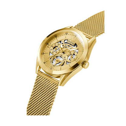 GUESS Mod. TAILOR gold watch with mesh band displaying elegant skeleton dial design