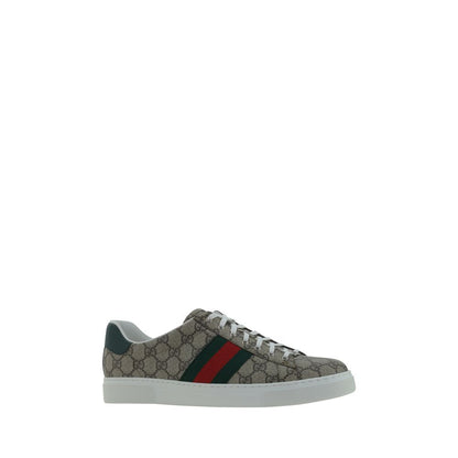 Alt Tag: Gucci Beige Rubber Low Top Sneakers with iconic GG jacquard, leather logo detail, contrasting platform sole, and lace-up front.