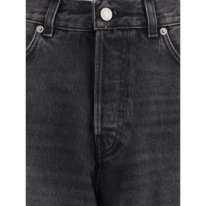 Close-up of Haikure Black Cotton Relaxed Fit Jeans with buttoned front, belt loops, and quality stitching detail.