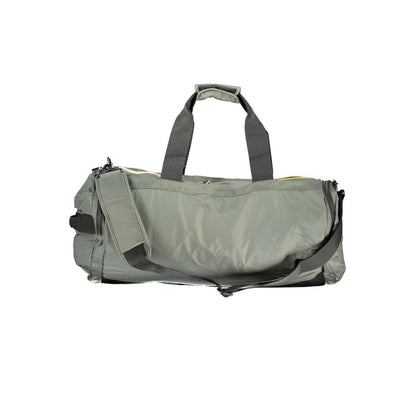 K-WAY Green Polyamide Luggage And Travel with adjustable strap, multiple pockets, and zip closure.