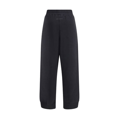 MM6 Black Cotton Joggers (Workout Pants) with elastic waistband, side pockets, and raw-cut slits, showcasing Maison Margiela's style.