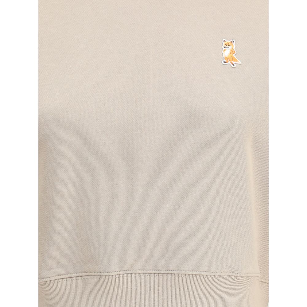 Maison Kitsuné Beige Cotton Sweatshirt with embroidered fox patch detail and ribbed crew neck, hem, and cuffs for a stylish urban look.