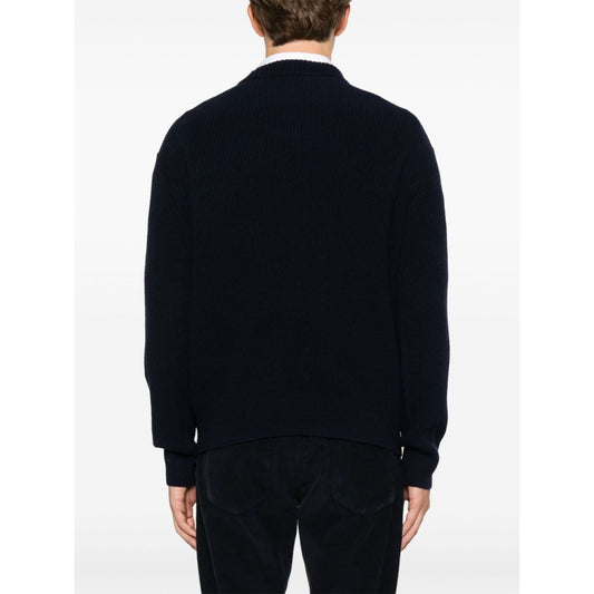 Back view of Maison Kitsuné MAISON KITSUNE' Sweaters Blue with ribbed trim and crew neck, worn by model. Wool jumper, true to size fit.