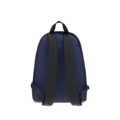 Rear view of Moncler Blue Nylon Backpack with adjustable straps and leather handle, showcasing elegant design and durability.