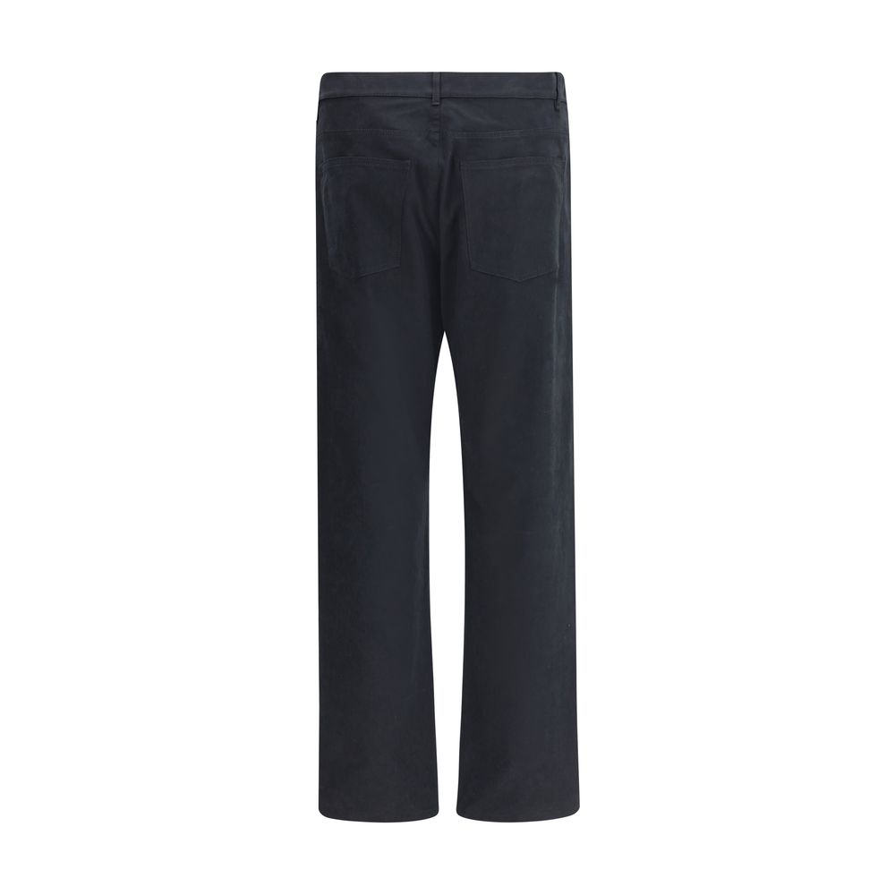 Back view of Moschino Black Cotton Casual Pants in classic straight-leg style with a distinctive front patch, five-pocket construction, and waist loops.