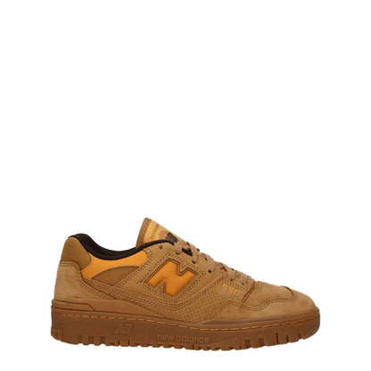 New Balance Brown Leather Sneakers with suede material, lace-up closure, and rubber sole, featuring logos on front, side, and back.