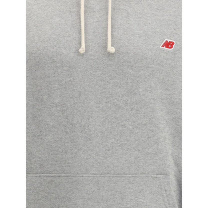 New Balance Gray Cotton Sweatshirt with logo, adjustable drawcord, and pouch pocket for comfort and style.