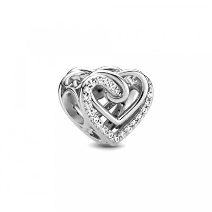 PANDORA Mod. 799270C01 silver heart-shaped jewel with intricate design and embellishments, perfect for ladies' charm bracelets.