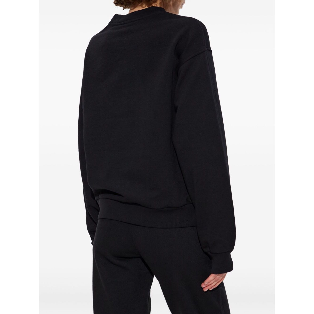 Back view of PS By Paul Smith Sweaters Black, featuring long sleeves, ribbed neckline, relaxed fit, and cotton Swirl Heart embroidery.