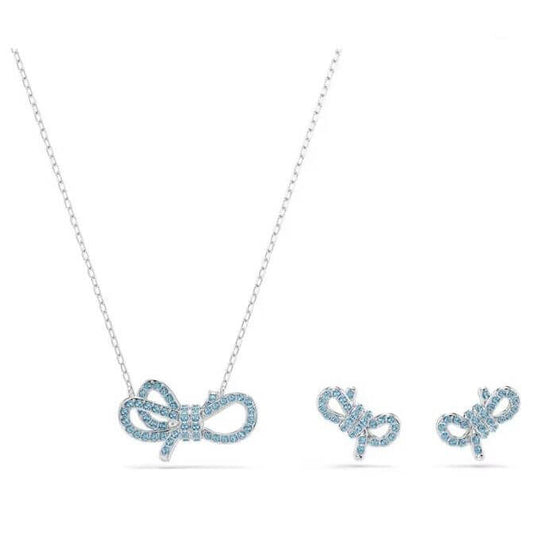 SWAROVSKI Mod. 5723554 Lifelong Bow Set with blue crystals and rhodium plating, includes necklace and earrings in bow design.