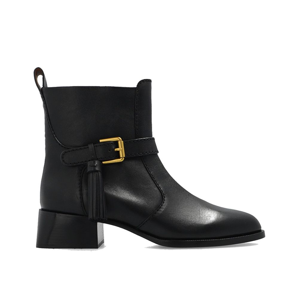 See By Chloé Black Calfskin Ankle Boots with leather lining, rubber sole, side zip, adjustable strap. Made in Spain.