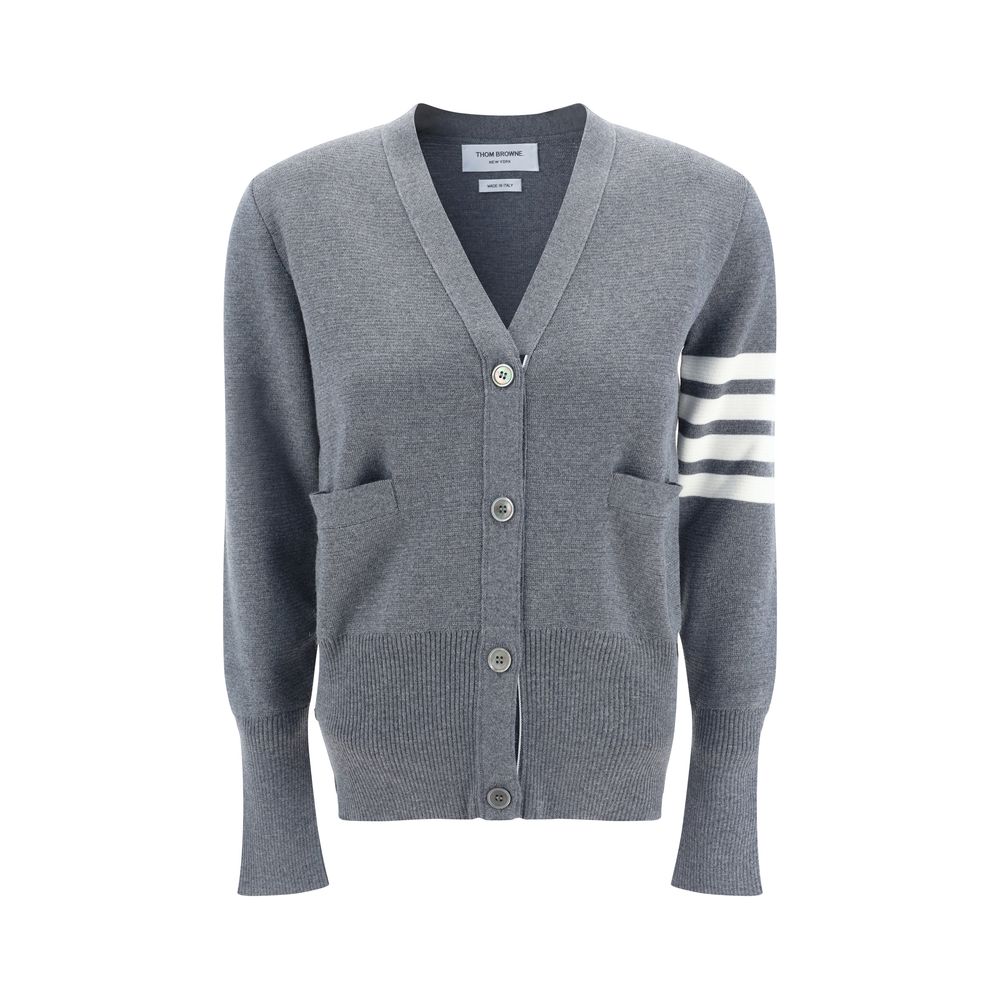 Alt Tag: Thom Browne Gray Fleece Wool Cardigan with contrasting buttons, open front pockets, V-neck, and brand bands on arm.