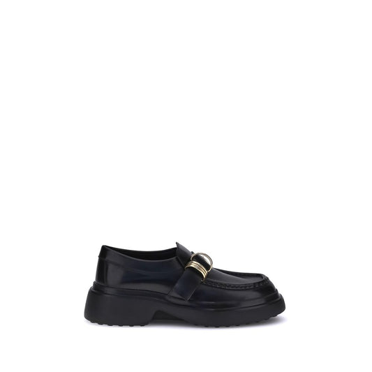Tod's Black Rubber Platform Loafers with metal rings and nappa leather, featuring a modern platform sole for a sophisticated style.