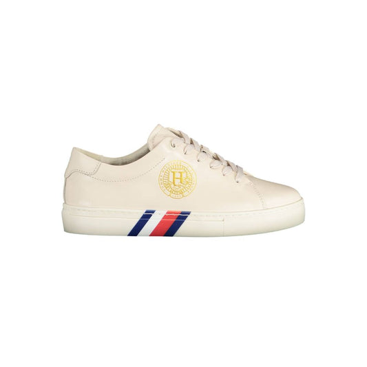 Tommy Hilfiger Beige Leather Women Sneaker with iconic logo and colorful stripes, crafted with premium materials for style and comfort.