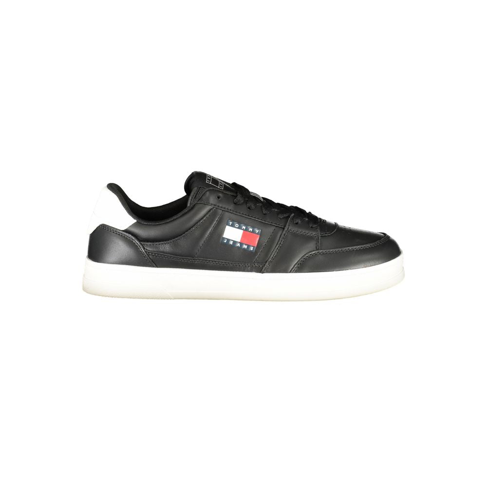 Tommy Hilfiger Black Leather Men Sneaker with white sole and logo emblem on side.
