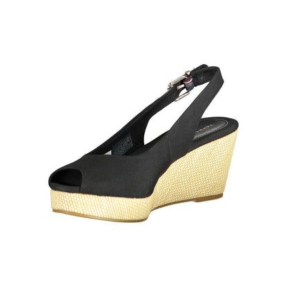 Tommy Hilfiger Black Leather Women Sandal with ankle buckle and wedge heel, perfect for chic events.